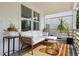 Inviting front porch featuring comfortable seating and stylish decor, perfect for relaxing outdoors at 5814 Knight St, Hanahan, SC 29410