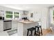 Modern kitchen featuring an island, stainless steel appliances, and ample cabinet space at 5814 Knight St, Hanahan, SC 29410