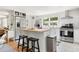 Modern kitchen featuring an island, stainless steel appliances, and ample cabinet space at 5814 Knight St, Hanahan, SC 29410
