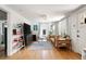 Bright living room with hardwood floors, complemented by stylish furnishings and ample natural light at 5814 Knight St, Hanahan, SC 29410