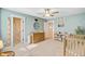 Well-lit Bedroom with light green walls, crib, changing table, and a growth chart at 596 Dunswell Dr, Summerville, SC 29486