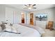Bedroom with a television and a glimpse into the bathroom and hallway at 596 Dunswell Dr, Summerville, SC 29486