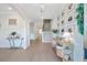 Bright and airy foyer featuring hardwood floors, elegant decor, and a staircase leading to the upper level at 596 Dunswell Dr, Summerville, SC 29486