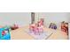 Spacious playroom with multiple toys and light walls at 596 Dunswell Dr, Summerville, SC 29486