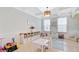 Bright playroom featuring a coffered ceiling, natural light, and plenty of storage space for toys and games at 596 Dunswell Dr, Summerville, SC 29486
