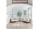 Sun-filled sitting area with large windows and cozy armchairs at 596 Dunswell Dr, Summerville, SC 29486