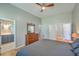 Spacious main bedroom featuring a view of an ensuite bathroom and walk-in closet at 6179 Fieldstone Cir, Charleston, SC 29414