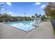 Community pool with modern design and ample deck space, perfect for relaxation and recreation at 6179 Fieldstone Cir, Charleston, SC 29414