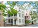 Charming multi-story home featuring a large front porch, offering an inviting and classic appeal at 66 Beaufain St, Charleston, SC 29401