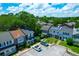 Aerial view of residential homes, parking, and mature tree coverage at 680 Buckhall Ct, Mount Pleasant, SC 29464