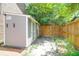 Backyard features a storage shed, wooden fence, and some plants at 680 Buckhall Ct, Mount Pleasant, SC 29464