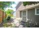 Backyard features a well-maintained privacy fence, shed and small patio at 680 Buckhall Ct, Mount Pleasant, SC 29464