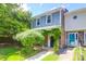 Charming two-story home with blue vinyl siding and brick facade at 680 Buckhall Ct, Mount Pleasant, SC 29464