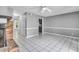 Living room featuring a brick fireplace and a view into the kitchen at 680 Buckhall Ct, Mount Pleasant, SC 29464