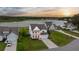 Stunning aerial view of homes with scenic lakefront views and lush green landscaping at 682 Pontoon Rd, Huger, SC 29450
