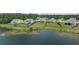 Aerial view of the backyard with a pond at 682 Pontoon Rd, Huger, SC 29450