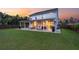 Large backyard with a covered patio, perfect for relaxing and entertaining at 682 Pontoon Rd, Huger, SC 29450