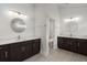 The bathroom offers double vanities, tile flooring and a private toilet room at 682 Pontoon Rd, Huger, SC 29450