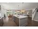 Bright kitchen with a view to the dining area and the backyard at 682 Pontoon Rd, Huger, SC 29450