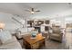 Open-concept living space with a modern kitchen, dining area, and comfortable living room seating at 682 Pontoon Rd, Huger, SC 29450