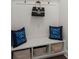 Convenient mudroom area with built-in bench, storage and Tommy Bahama pillows at 682 Pontoon Rd, Huger, SC 29450