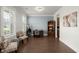 Bright office space with custom shelving, hardwood floors, comfortable seating and shutters at 682 Pontoon Rd, Huger, SC 29450