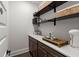 Walk-in pantry featuring ample shelving, counter space, and storage solutions at 682 Pontoon Rd, Huger, SC 29450