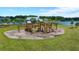 A nice playground, pool, and clubhouse area of the community near a beautiful lake at 682 Pontoon Rd, Huger, SC 29450