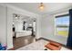 Sitting area boasts serene water views and lots of light, attached to main bedroom at 682 Pontoon Rd, Huger, SC 29450