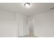 Neutral bedroom showcasing closet, door to hall and a fun decorative ceiling at 700 Silver Moss Dr, Moncks Corner, SC 29461