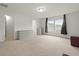Expansive bedroom with carpet, natural light, and neutral walls; drawers for storage at 700 Silver Moss Dr, Moncks Corner, SC 29461