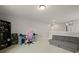Cozy bedroom with carpet flooring, built-in desk, shelves, and gray futon at 700 Silver Moss Dr, Moncks Corner, SC 29461