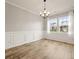 Spacious dining room with hardwood floors and large windows at 700 Silver Moss Dr, Moncks Corner, SC 29461