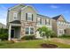 Charming two-story home with a manicured front yard and inviting curb appeal at 700 Silver Moss Dr, Moncks Corner, SC 29461