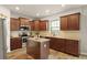 Beautiful kitchen featuring granite countertops, a central island, and stainless steel appliances at 700 Silver Moss Dr, Moncks Corner, SC 29461