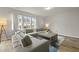 Inviting living room features a large sectional sofa and abundant natural light at 700 Silver Moss Dr, Moncks Corner, SC 29461