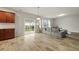 Bright and airy living room with sliding glass doors to the backyard at 700 Silver Moss Dr, Moncks Corner, SC 29461