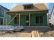 New construction home with wood sheathing, window framing, and under construction dormer at 822 Gentle Breeze Dr, Summerville, SC 29486