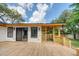 Beautiful outdoor deck great for entertaining with well maintained fence and home exterior at 841 Fred St, Charleston, SC 29412