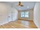 Bright bedroom with vaulted ceiling, wood floors, and a window for natural light at 841 Fred St, Charleston, SC 29412