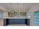 Modern kitchen with gray cabinets, stainless steel appliances, and a large island with seating at 841 Fred St, Charleston, SC 29412
