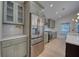 Contemporary kitchen with stainless steel appliances, gray cabinets, and light countertops at 841 Fred St, Charleston, SC 29412