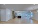 Bright and open-concept living room with hardwood floors, recessed lighting, and an open kitchen at 841 Fred St, Charleston, SC 29412