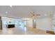 Bright and open-concept living room with hardwood floors, recessed lighting, and an open kitchen at 841 Fred St, Charleston, SC 29412