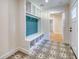 Well-organized mudroom with built-in bench and storage, offering functionality and style at 841 Fred St, Charleston, SC 29412