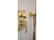 Modern gold shower fixtures stand out against a marble tile wall at 841 Fred St, Charleston, SC 29412