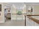 Second story hallway with lots of light and access to several bedrooms with off-white carpet at 8662 W Fairway Woods Dr, North Charleston, SC 29420