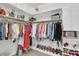 Organized walk-in closet with ample storage and fashionable apparel at 8662 W Fairway Woods Dr, North Charleston, SC 29420