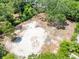 Aerial view of a vacant lot with scattered trees at 952 Mccants Dr, Mount Pleasant, SC 29464