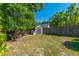 Fenced backyard with shed, providing ample space for storage and outdoor activities at 9590 Crosscut Dr, Ladson, SC 29456
